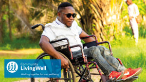man using wheelchair takes physical activity in the park  